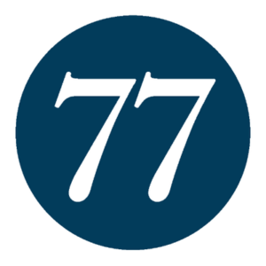 A blue circle with the number 7 7 in it.